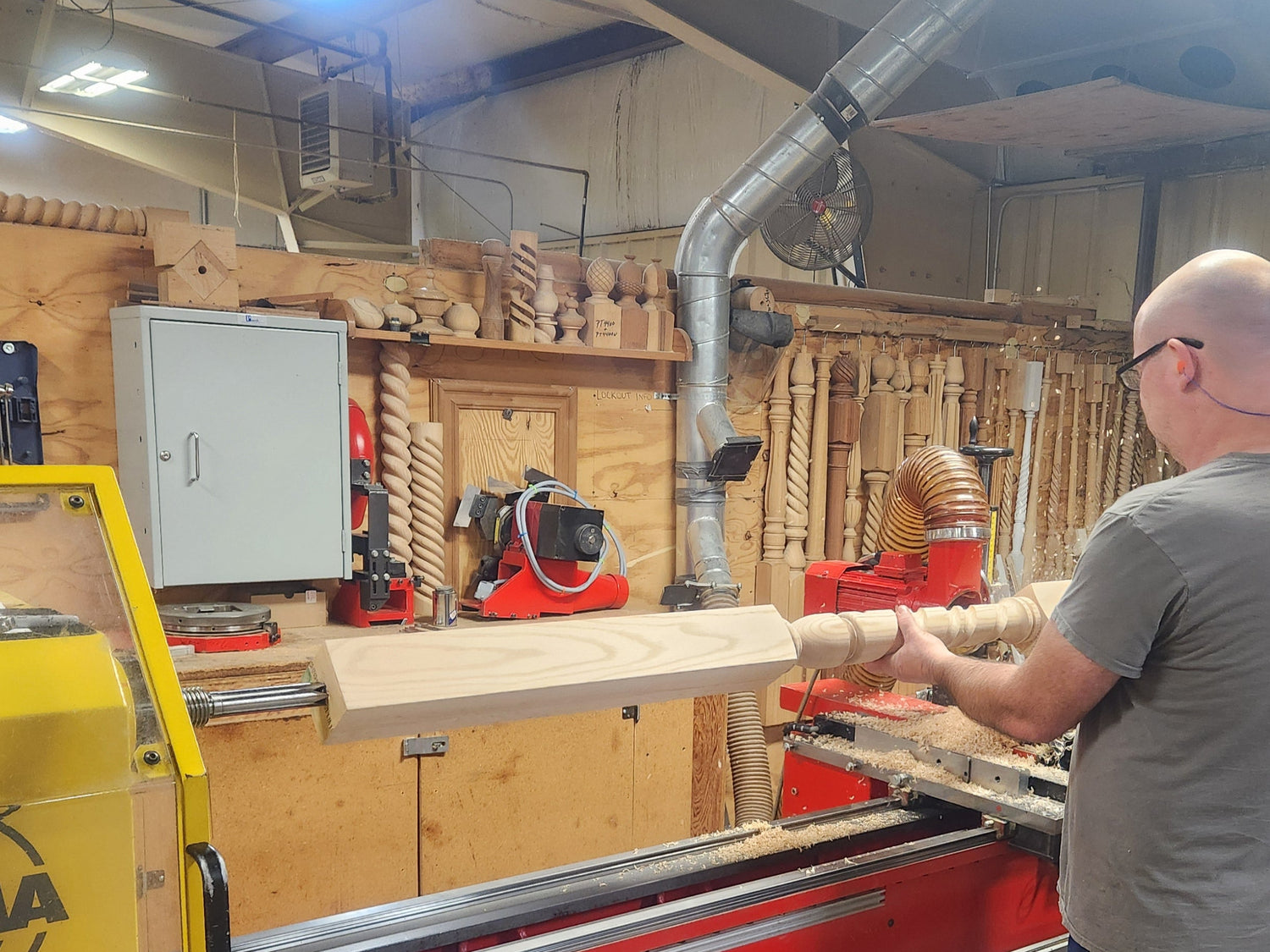 Person operating a WEMA machine in a workshop setting